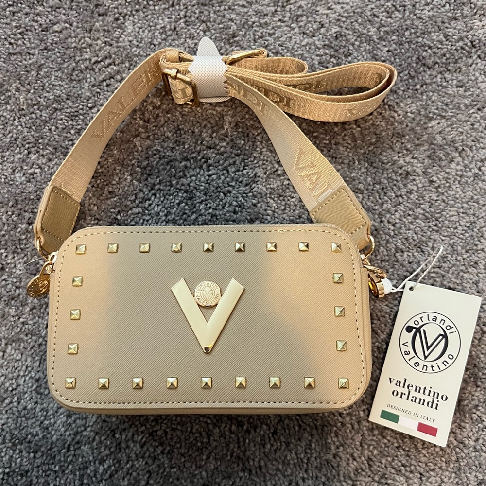 Valentino Orlando Gold Studded Crossbody Bag
W/guitar strap. NWT